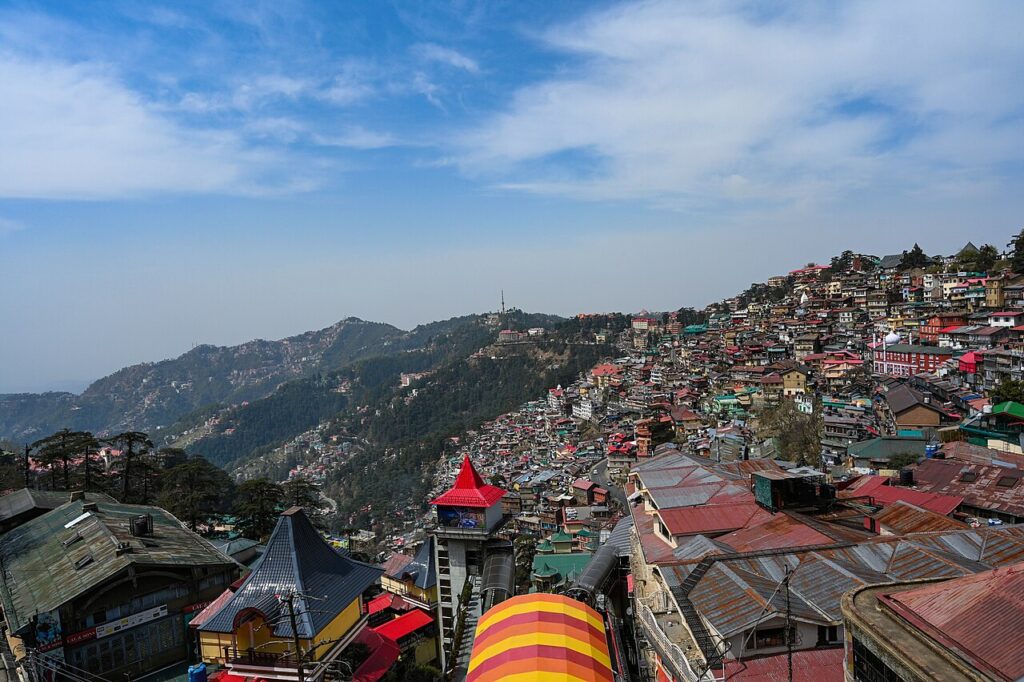 The Ridge mall road and snowy hills in Shimla Himachal Pradesh