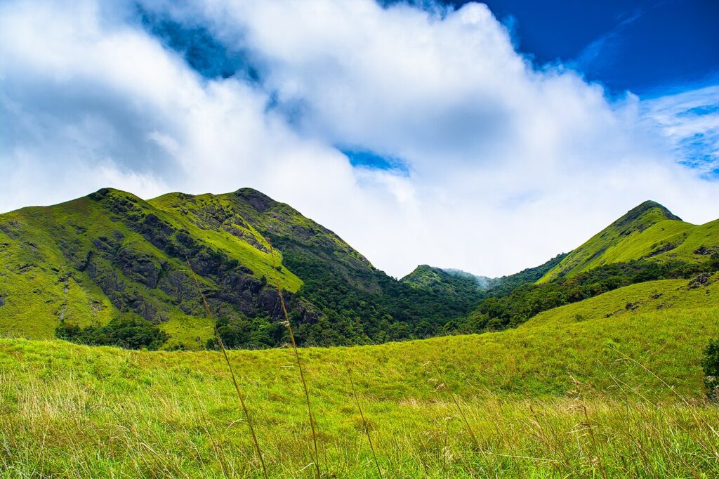 Banasura Sagar dam boating and green hills in Wayanad Kerala
